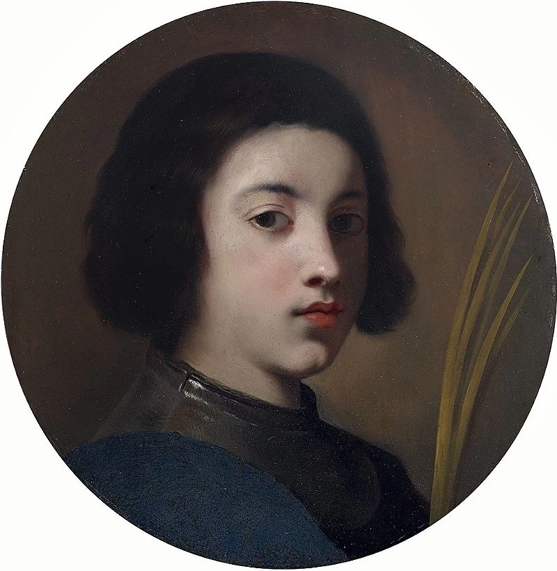 Giovane ragazzo con la palma del martirio